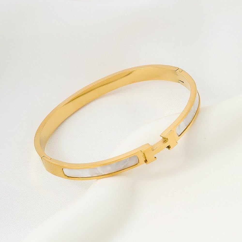 H- WHITE HANDCUFF
