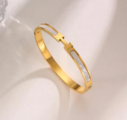 H- WHITE HANDCUFF