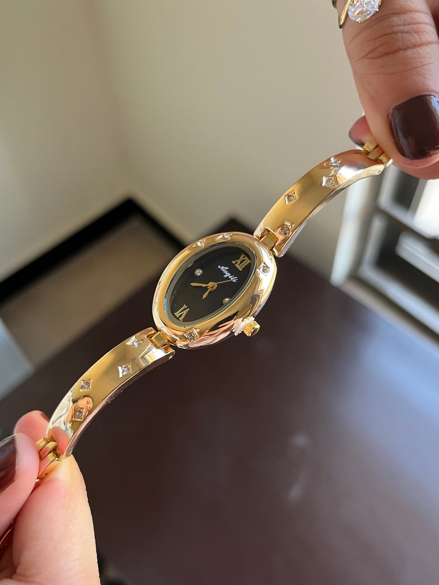 Oval Gleem Black Dial Watch