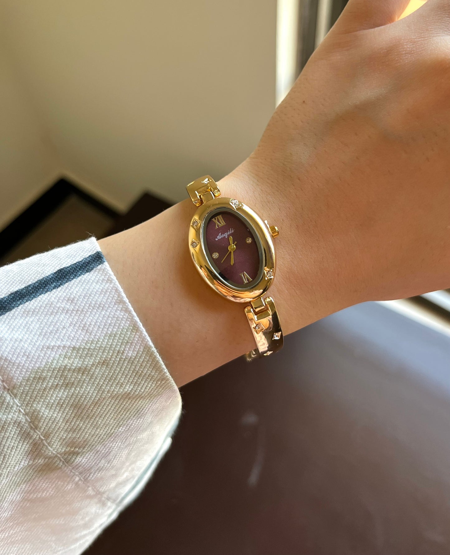 Oval Gleem Maroon Dial Watch