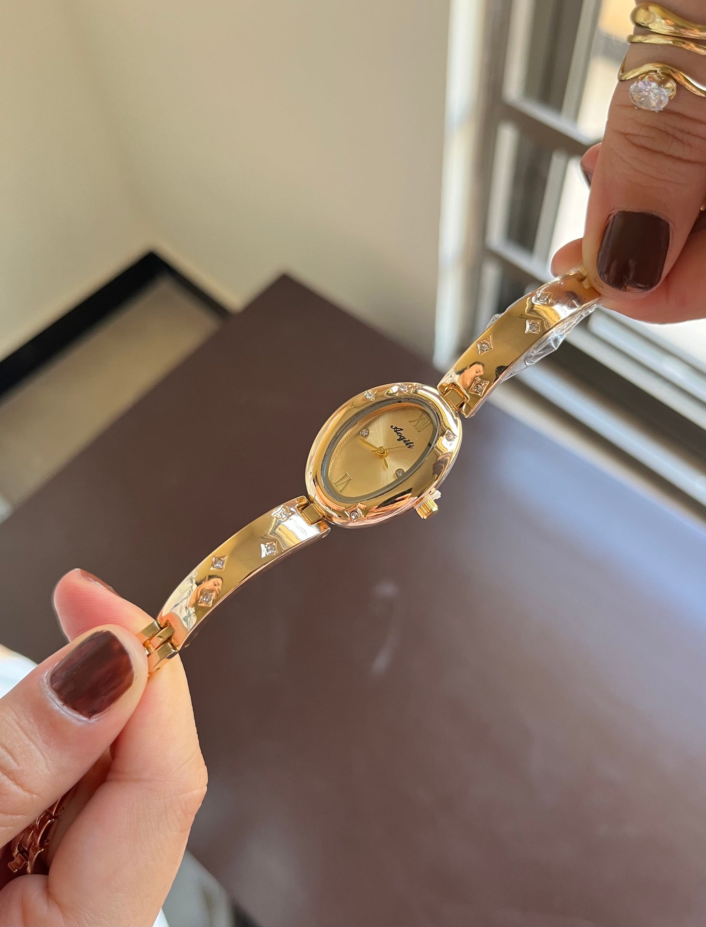 Oval Gleem golden Dial Watch