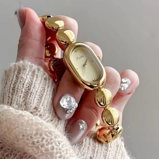AMIGAL OVAL NICHE VINTAGE WATCH-Gold Dial