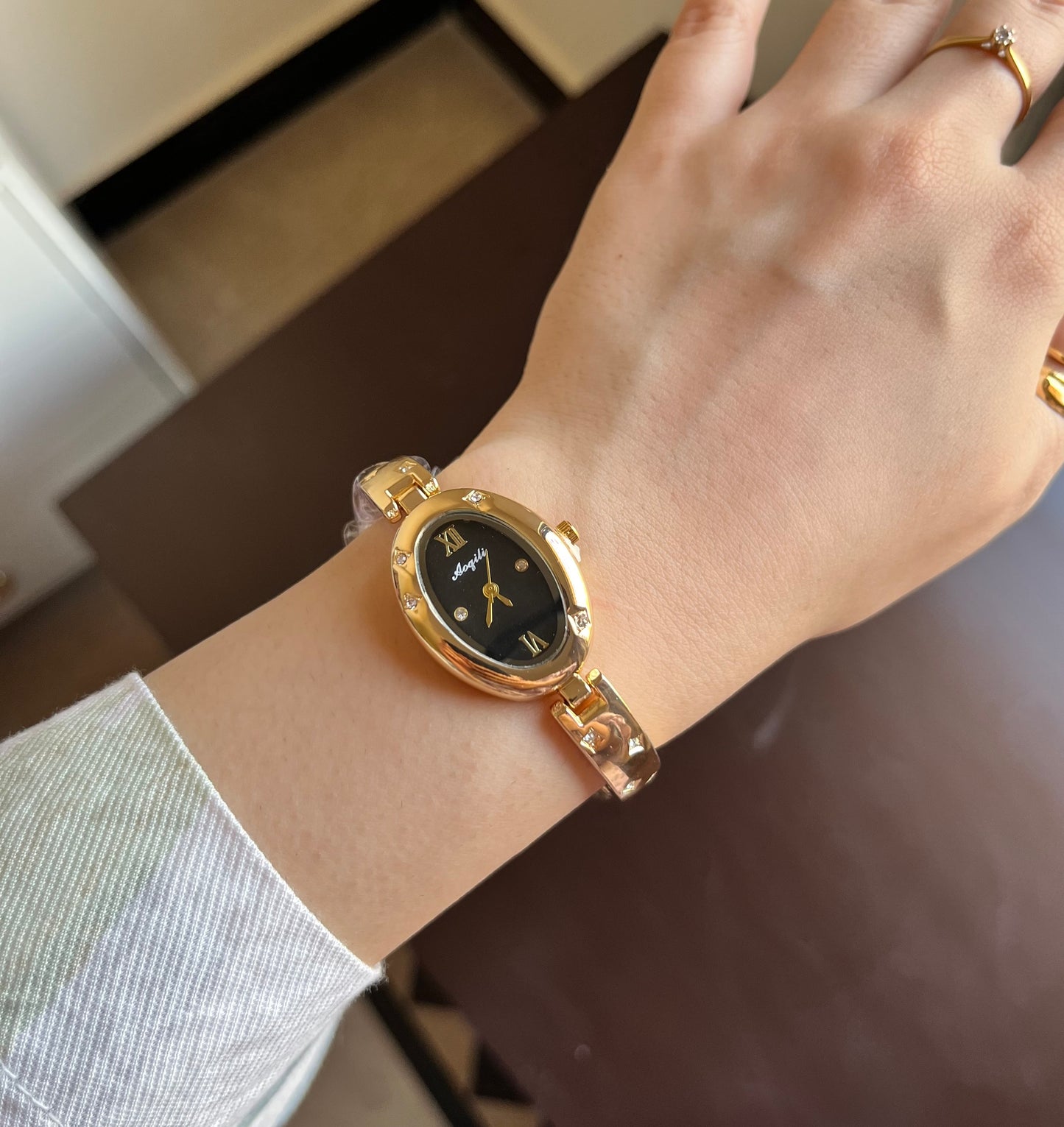 Oval Gleem Black Dial Watch