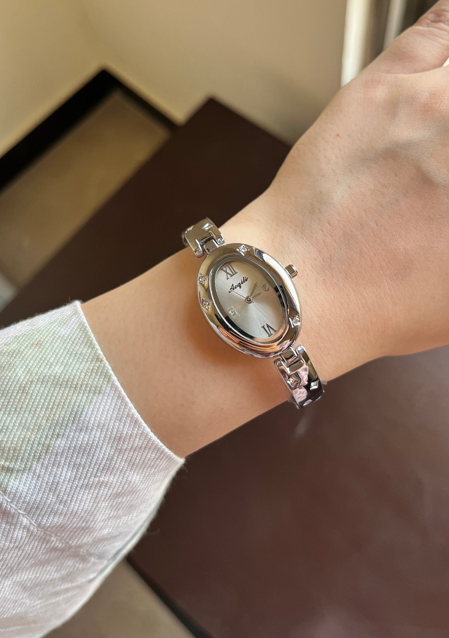 Oval Gleem white Dial Watch