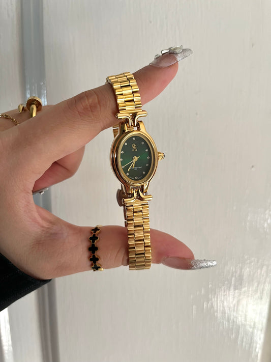 GOLD X GREEN DIAL WATCH