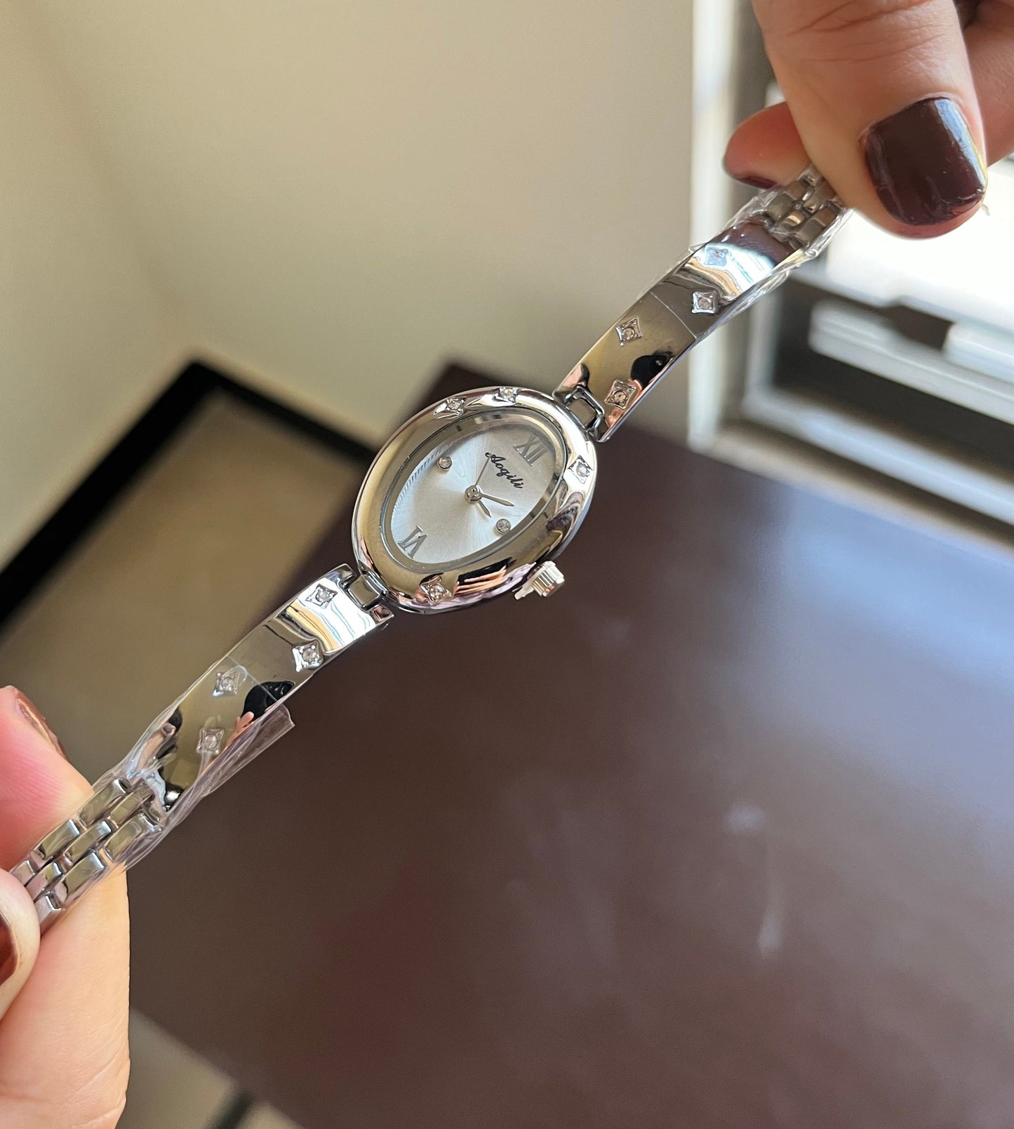 Oval Gleem white Dial Watch