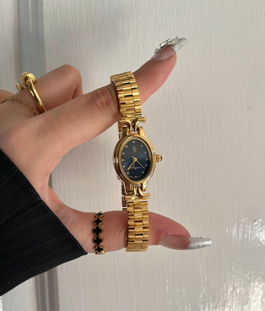 GOLD X SAPPHIRE DIAL WATCH