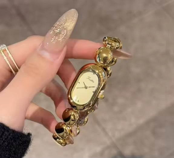 AMIGAL OVAL NICHE VINTAGE WATCH-Gold Dial