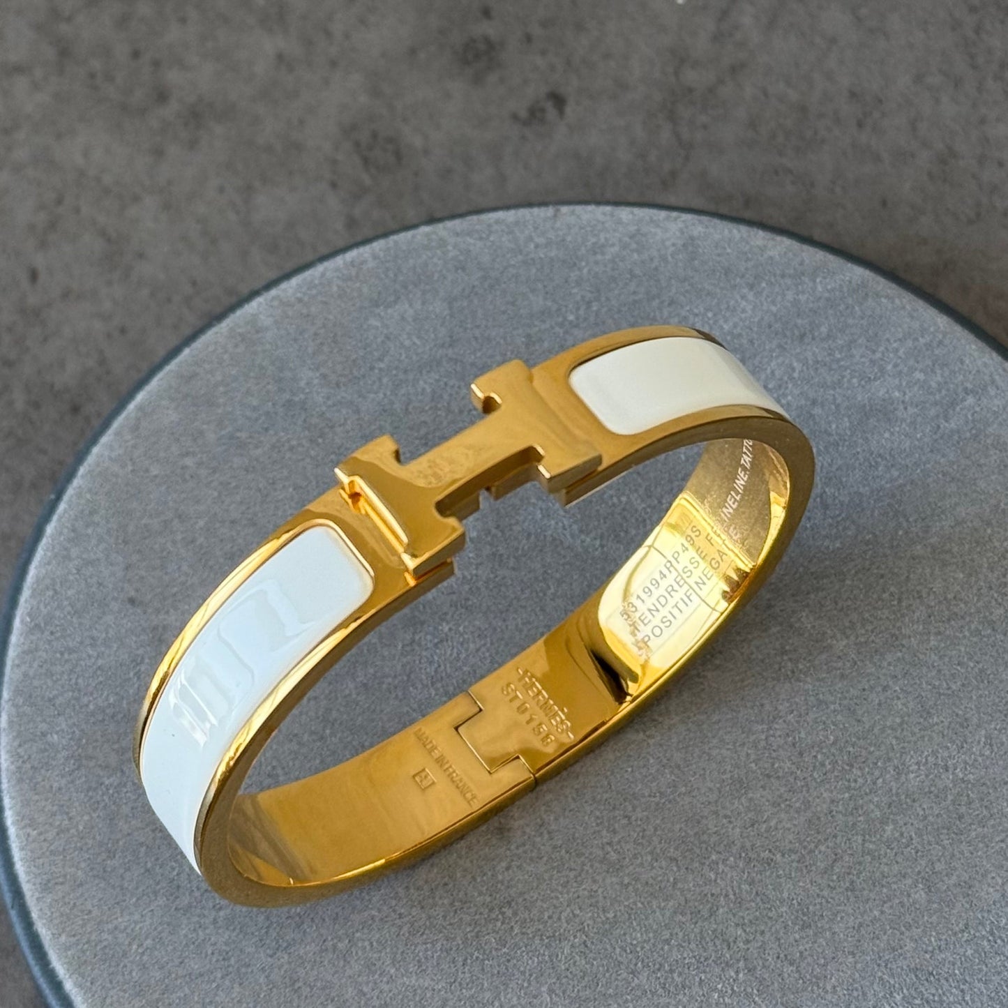 H- WHITE HANDCUFF