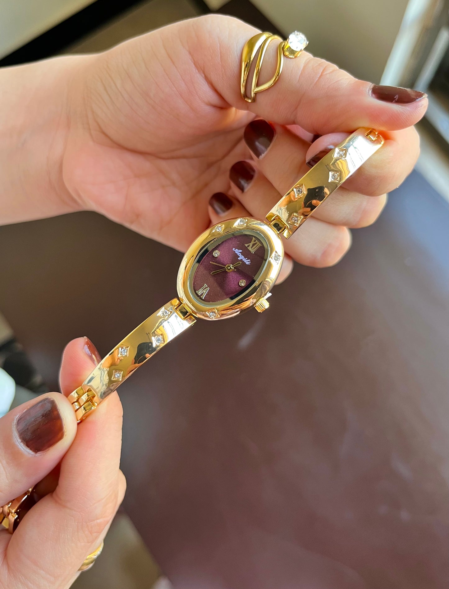 Oval Gleem Maroon Dial Watch